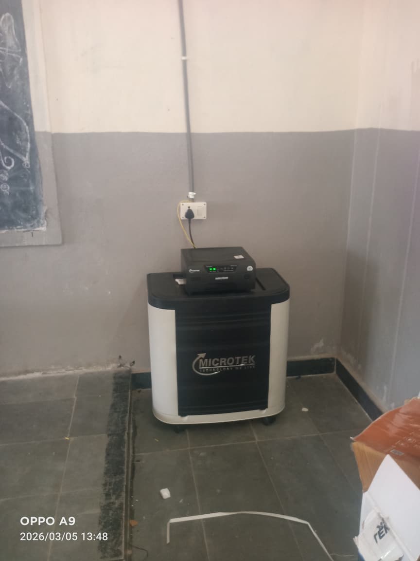 Microtek inverter and tall tubular battery backup system installed in a school classroom in Hyderabad by Satyajan Energy Solutions.